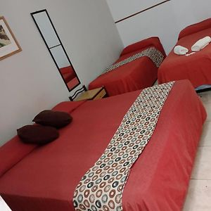 Quarto padrão para quatro pessoas